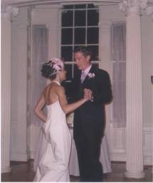 Custom bridal headpiece of ivory and purple feathers